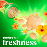Open Gain bottle spilling scent beads and illustrated bursting fragrance spheres with tropical flowers
