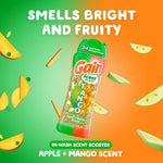 Tilted Gain Tango bottle on green-to-orange gradient with floating apple and mango slices and the phrase smells bright and fruity