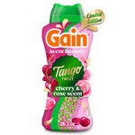 Tall pink and green Gain Tango Twist scent booster bottle with cherry and rose graphics