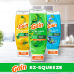 Three Gain Ultra Clean EZ-Squeeze bottles in different scents displayed on a kitchen counter with EZ-Squeeze banner