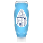 Rear view of an upside-down blue Gain Ultra Clean EZ‑Squeeze bottle showing ingredient panel, barcode and usage instructions