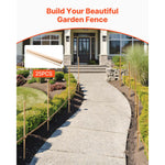 Pathway lined with wooden garden stakes forming a simple decorative fence in a landscaped yard