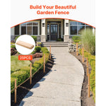 Pathway lined with wooden garden stakes used as a low fence beside a landscaped walkway and house entrance.