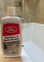 Gel-Gloss Kitchen & Bath Polish bottle placed on a bathroom edge with tub and shower in background