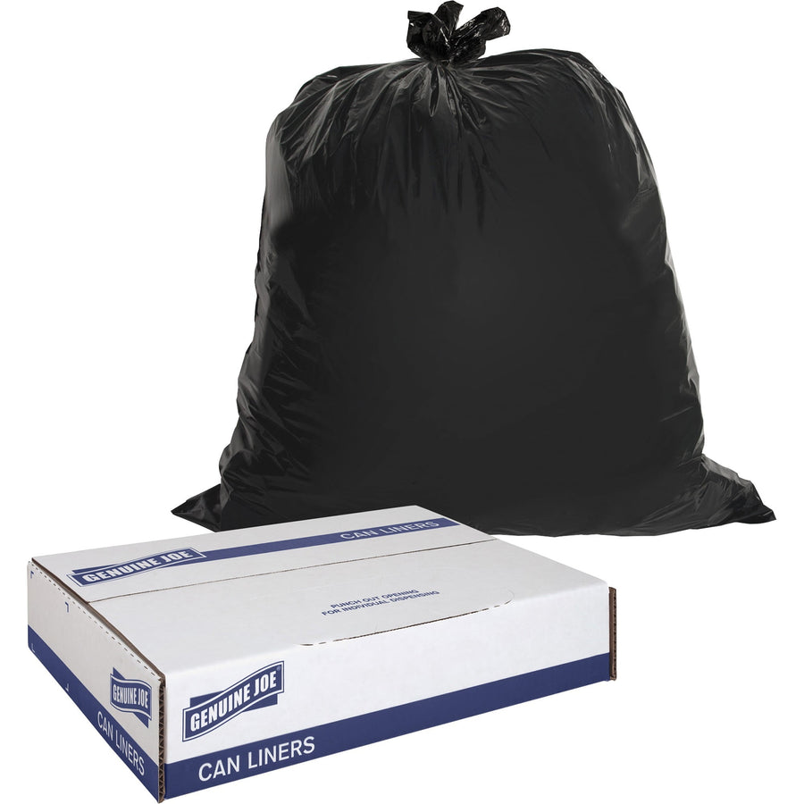Tied black heavy-duty trash bag standing behind a white Genuine Joe box labeled “Can Liners.”