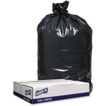Tied black trash bag standing behind a Genuine Joe cardboard box labeled “Can Liners.”