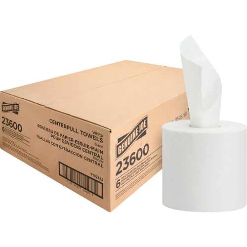 Cardboard shipping box labeled Genuine Joe 23600 next to a white center-pull paper towel roll with a sheet pulled out