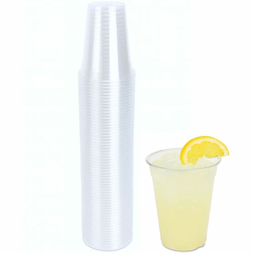 Genuine Joe clear disposable plastic cups stacked tall with a filled cup of lemonade shown beside them.