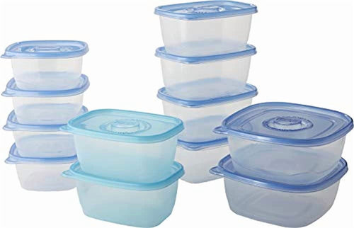Assortment of clear plastic Glad storage containers with blue lids arranged in stacks