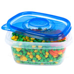 Clear rectangular Glad container filled with peas and carrots, topped with a translucent blue Glad interlocking lid.