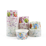 Stacks of Glad Disney Princess patterned paper snack bowls showing multiple floral-frame designs