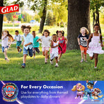 Group of children running outdoors with Glad for Kids logo and Paw Patrol promotion banner at bottom