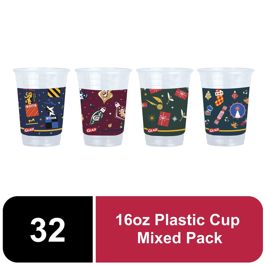 Four clear plastic cups displayed side-by-side, each with a different Glad x Harry Potter holiday-themed printed wrap design.