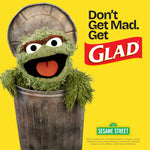 Sesame Street's Oscar the Grouch popping from a trash can beside Glad logo and tagline 'Don't Get Mad. Get Glad.' on yellow background