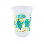 Single clear Glad plastic cup with teal palm-leaf and yellow dash print on a white background