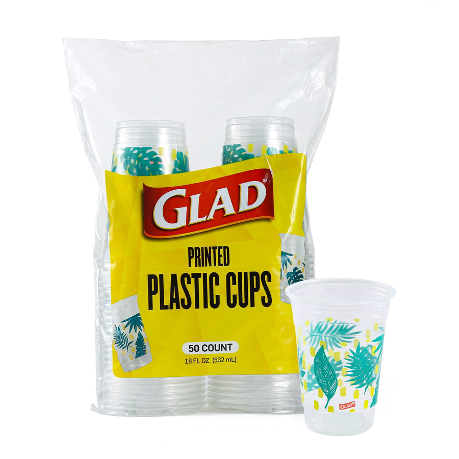 Clear Glad printed plastic cup pack with teal palm-leaf design visible through yellow branded label