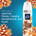 Glade Cashmere Woods can on blue background with floral artwork and notes of jasmine, sandalwood, and musk