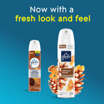 Two Glade Cashmere Woods soft mist cans shown side by side with text announcing a fresh new look