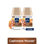 Two Glade Cashmere Woods automatic spray refill cans with floral pinecone artwork and two-pack label