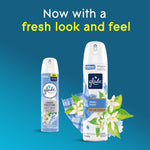 Two Glade Clean Linen aerosol cans shown with floral artwork and headline proclaiming a fresh new look