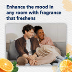 Lifestyle image of a smiling couple on a sofa with header text about enhancing the mood and citrus illustrations