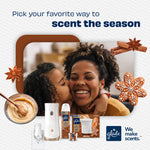 Promotional image of mother and child hugging with Glade product lineup and gingerbread graphics encouraging seasonal scenting.
