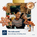 Smiling adult and child in holiday setting with Glade product thumbnails and gingerbread-themed decorative elements