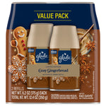Packaged value pack of two Glade Cozy Gingerbread automatic spray refills with festive gingerbread design
