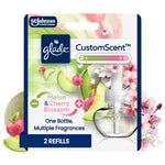 Glade CustomScent refill packaging showing melon and cherry blossom artwork with one refill bottle visible