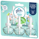 Close-up of Glade Dewdrop Petals five-pack refill blister with logo, clear oil bottles and blue-green packaging artwork