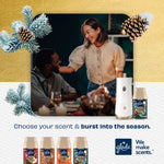 Dinner table lifestyle image of two people with Glade dispenser and Twinkling Pine & Cedar refill displayed
