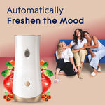 Glade automatic dispenser with apple and cinnamon graphics beside three people sitting on a couch and 'Automatically Freshen the Mood' text
