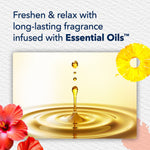 Close-up graphic of golden oil droplet and copy about long-lasting fragrance infused with essential oils, with pineapple and hibiscus accents