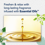 Graphic showing a golden oil droplet ripple and copy about long-lasting fragrance infused with essential oils, decorated with jasmine flowers.
