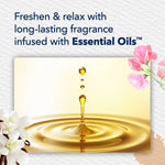 Graphic of golden oil drop splash with text about long-lasting fragrance infused with essential oils