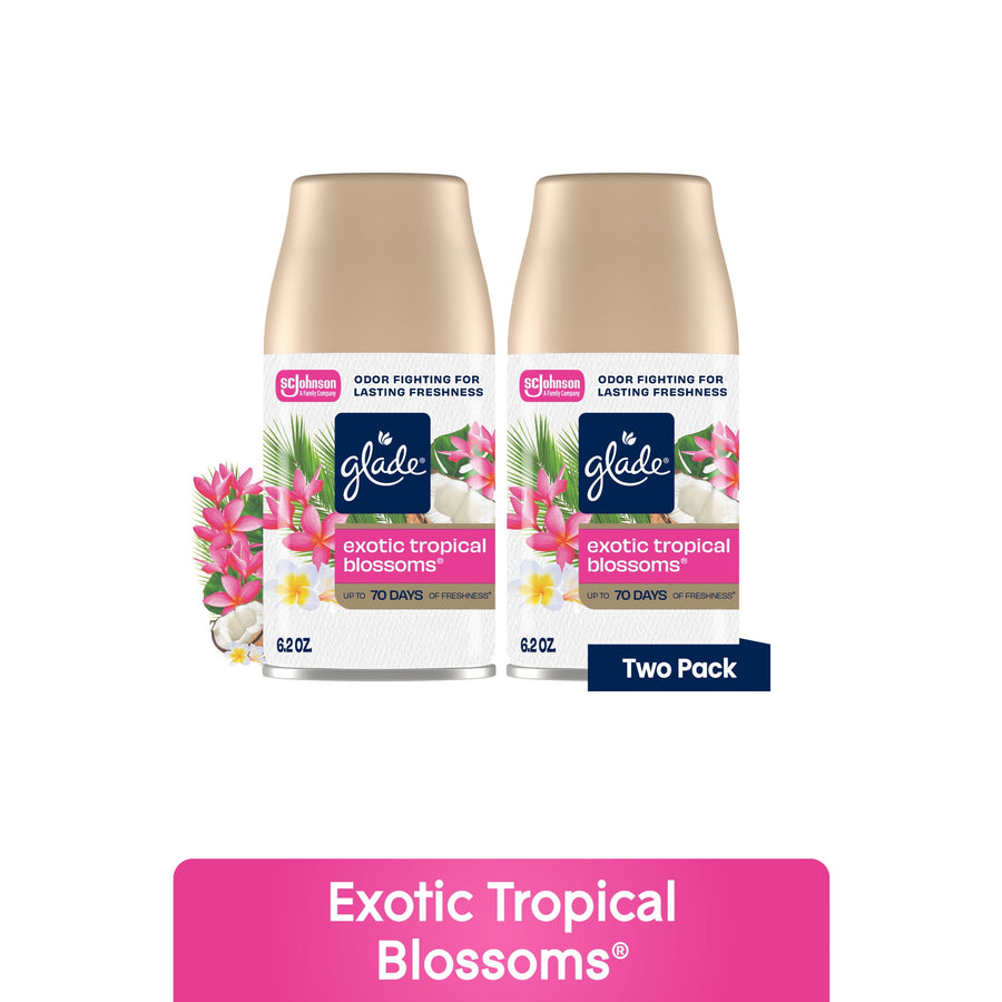 Two Glade automatic spray refill cans labeled Exotic Tropical Blossoms with floral graphics
