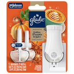 Close-up of Glade PlugIns Golden Pumpkin & Spice starter kit packaging showing warmer and two refill oil bulbs