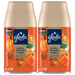 Two Glade Golden Pumpkin & Spice automatic spray refill cans with orange seasonal label and beige caps