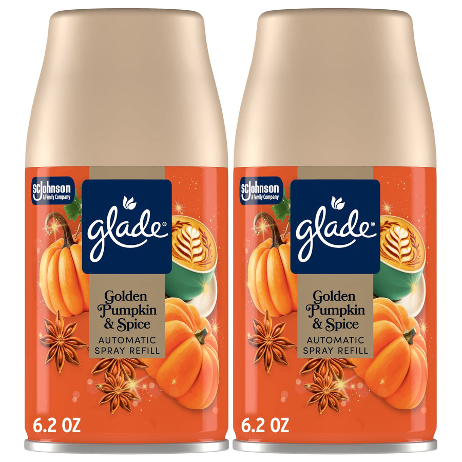 Two Glade Golden Pumpkin & Spice automatic spray refill cans with orange seasonal label and beige caps