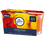 Glade Hawaiian Breeze twin jar candle pack angled to show glass jars and colorful hibiscus and pineapple packaging