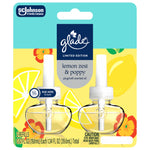 Closeup of Glade limited edition lemon zest & poppy plug‑in refill twin pack showing two clear refill bottles and branded card