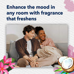 Lifestyle image of a smiling couple on a couch with headline enhancing the mood with fragrance that freshens