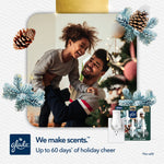 Lifestyle photo of a smiling father lifting a laughing child with Glade plug-in and product pack inset and pine decorations