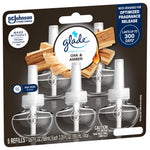Angled front view of Glade Oak & Amber refill blister pack highlighting wood imagery, five clear bottles and branding
