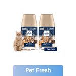 Two Glade Pet Fresh automatic spray refills with pet images on labels and a cat next to the cans on a white background