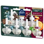 Angled view of Glade PlugIns seven-refill blister card featuring pine cones, cherries and citrus scent artwork
