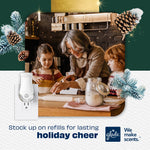 Lifestyle scene of family baking with a Glade PlugIns warmer graphic and holiday pine cone decorations promoting refills