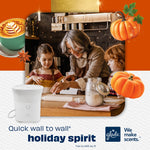 Lifestyle image of family baking with Glade Scent Flow device and pumpkin graphics promoting holiday scent