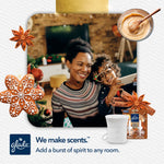 Smiling woman and child in living room with Glade Scent Flow device and refill pack shown in corner