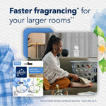 Scene of person folding laundry on sofa with Glade ScentFlow device and a Glade refill pack, promoting faster fragrancing for larger rooms
